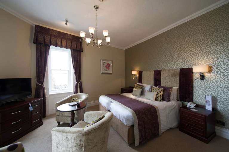 Imperial Hotel Accommodation Bedroom with Seating Area