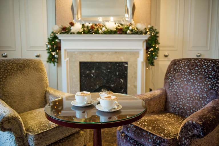 Imperial Hotel Comfortable Seating Area with Coffees Decorated for Christmas