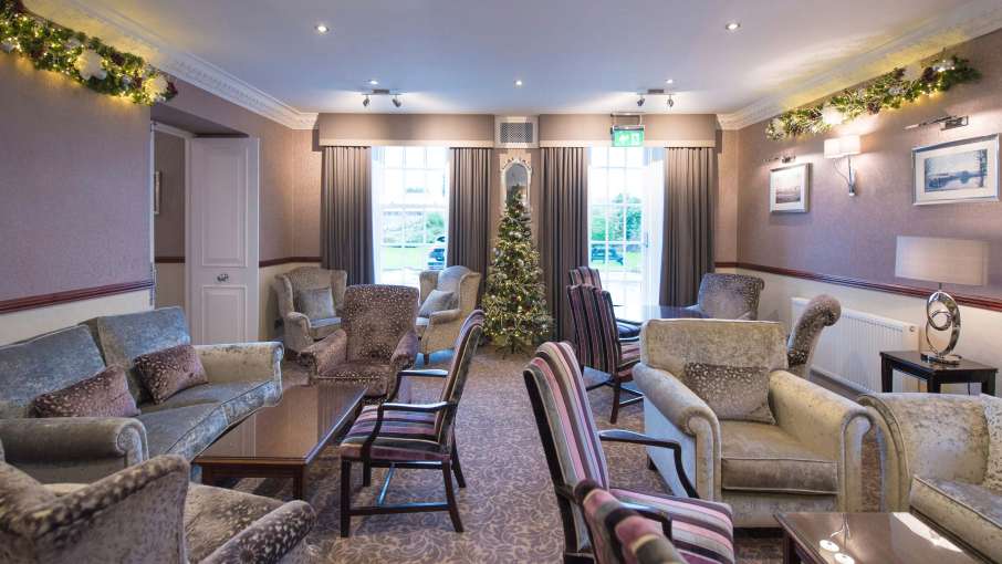 Imperial Hotel Comfortable Seating Area Decorated for Christmas