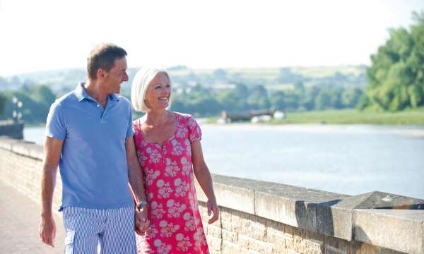 Imperial Hotel Couple Walking along the River Taw