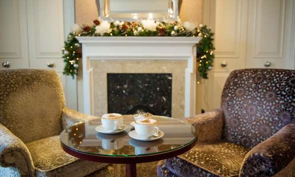 Imperial Hotel Comfortable Seating Area with Coffees Decorated for Christmas