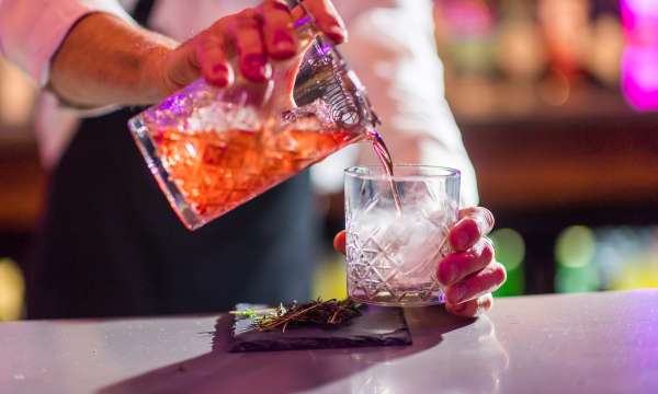 A bartender making smoking cocktails at Bar62 in barnstaple