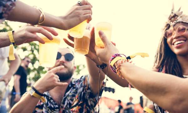 Group of Friends having a drink at festival