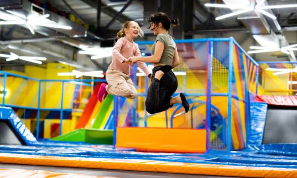 Girls on Trampoline Attraction Jumping