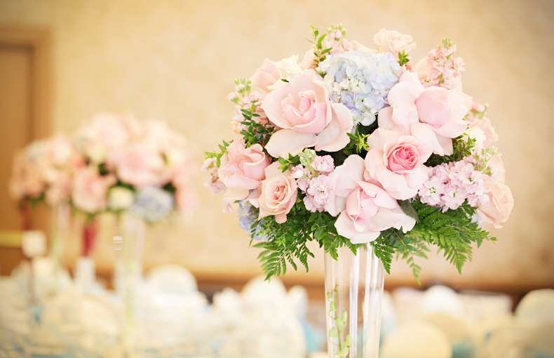 Bouquet of Flowers on Tables at Wedding Reception